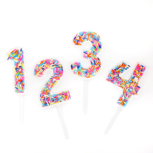 Sprinkle filled number cake toppers